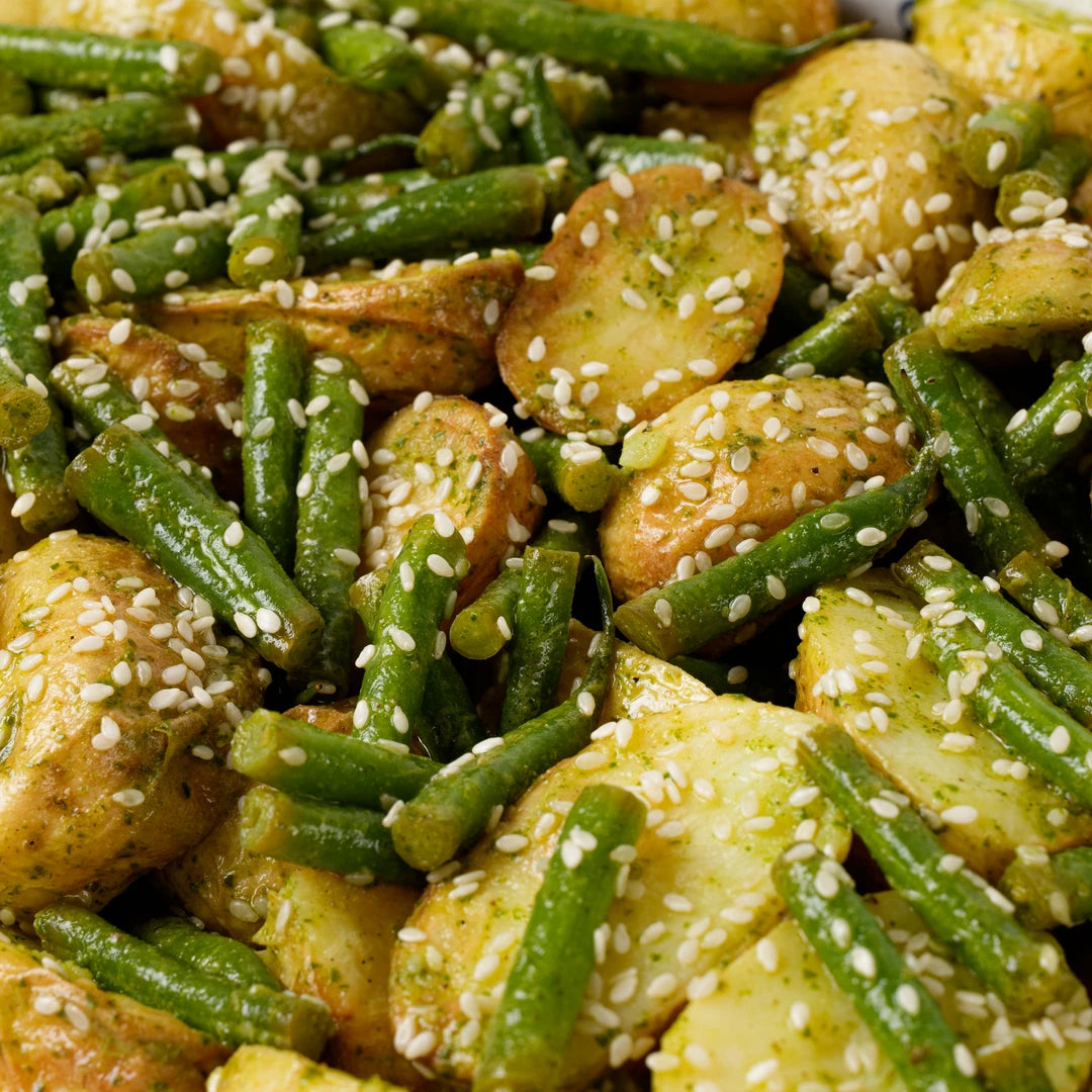 Close up of baby potato, green beans and sesame seeds, Route Catering London
