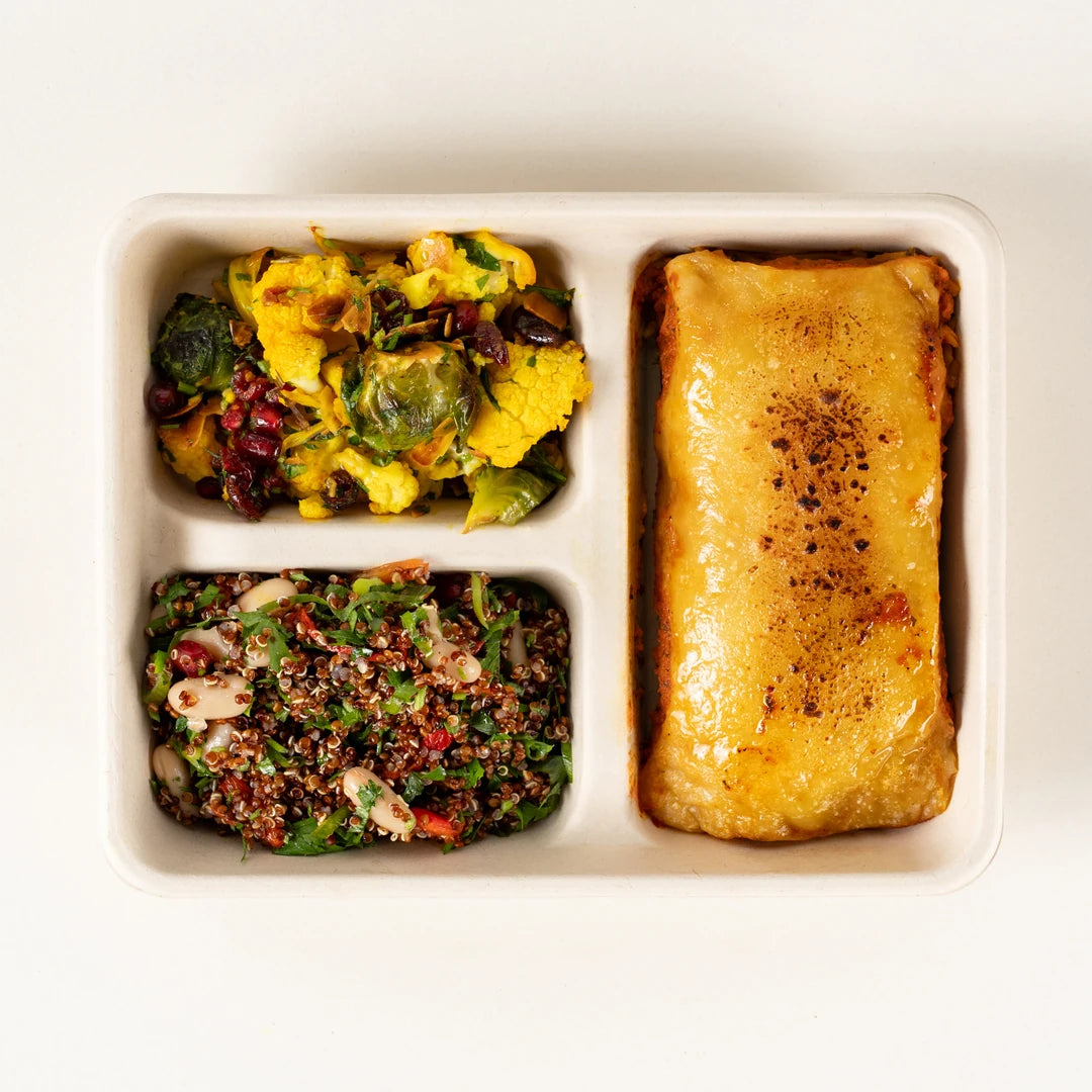 Beef Lasagne Bechamel Lunchbox from above with cauliflower and Brussels sprout salad and red quinoa salad - Route Catering