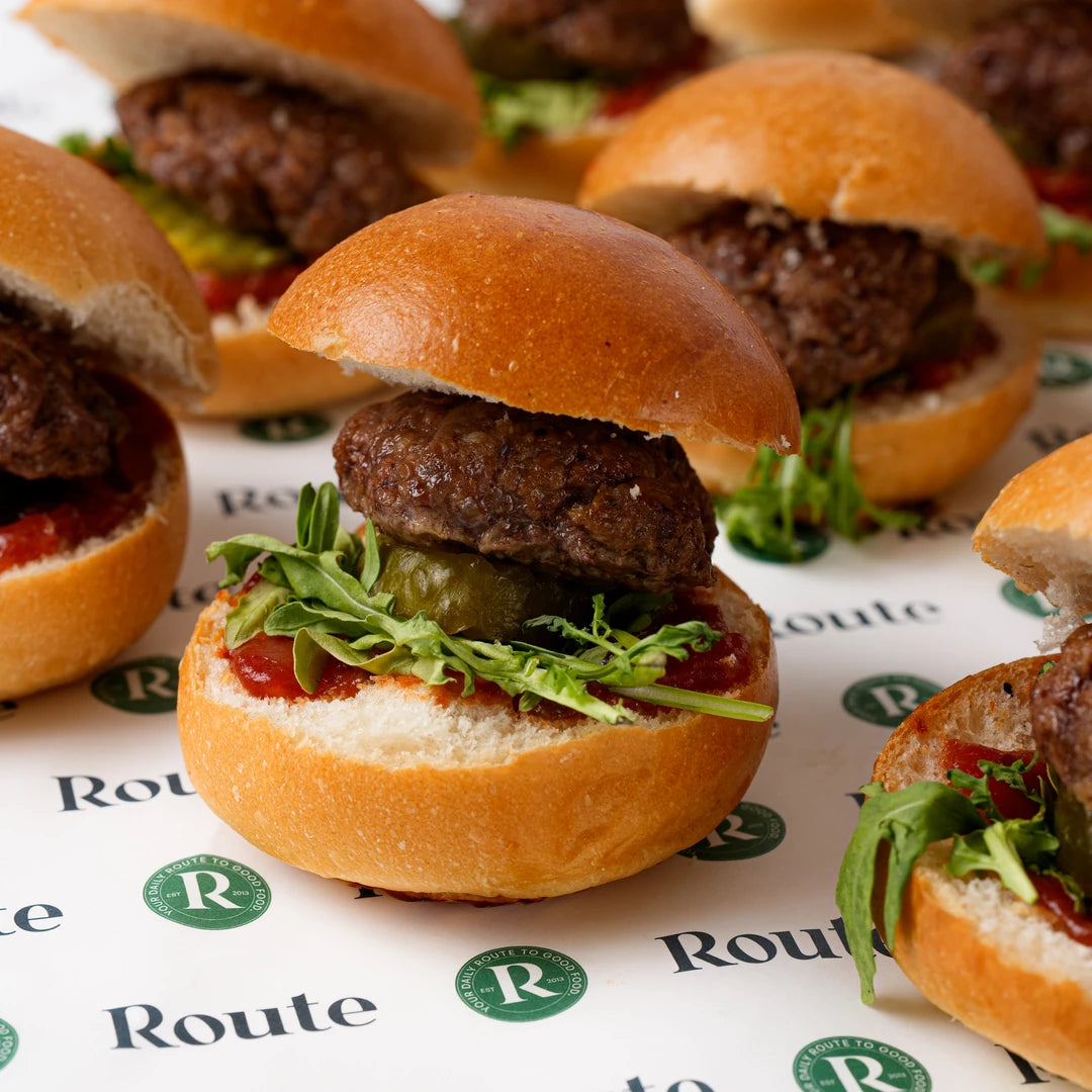 Close up of beef sliders in brioche buns, corporate catering London, Route Catering