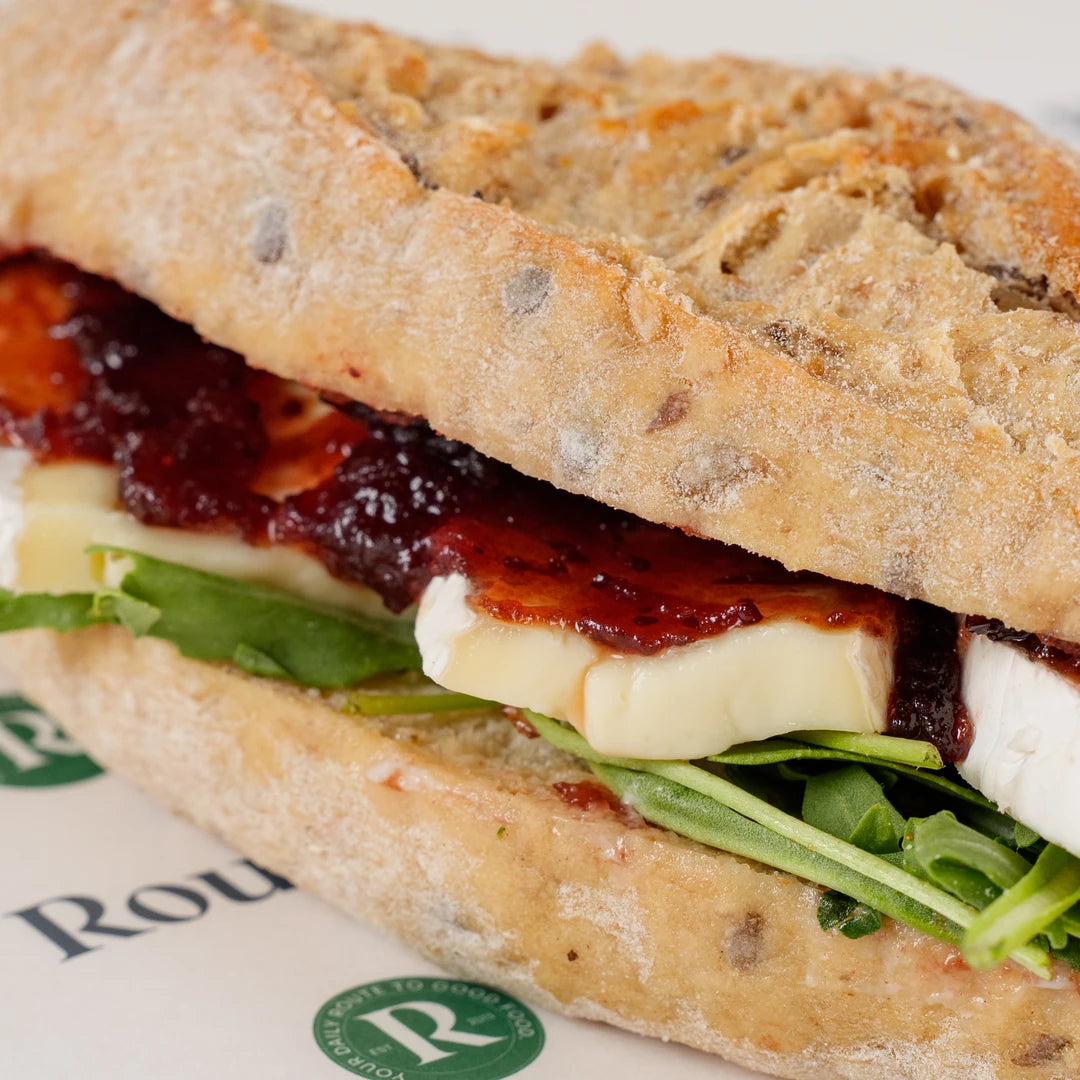 Brie and Cranberry Baguette, side view of the seeded baguette - Route Catering