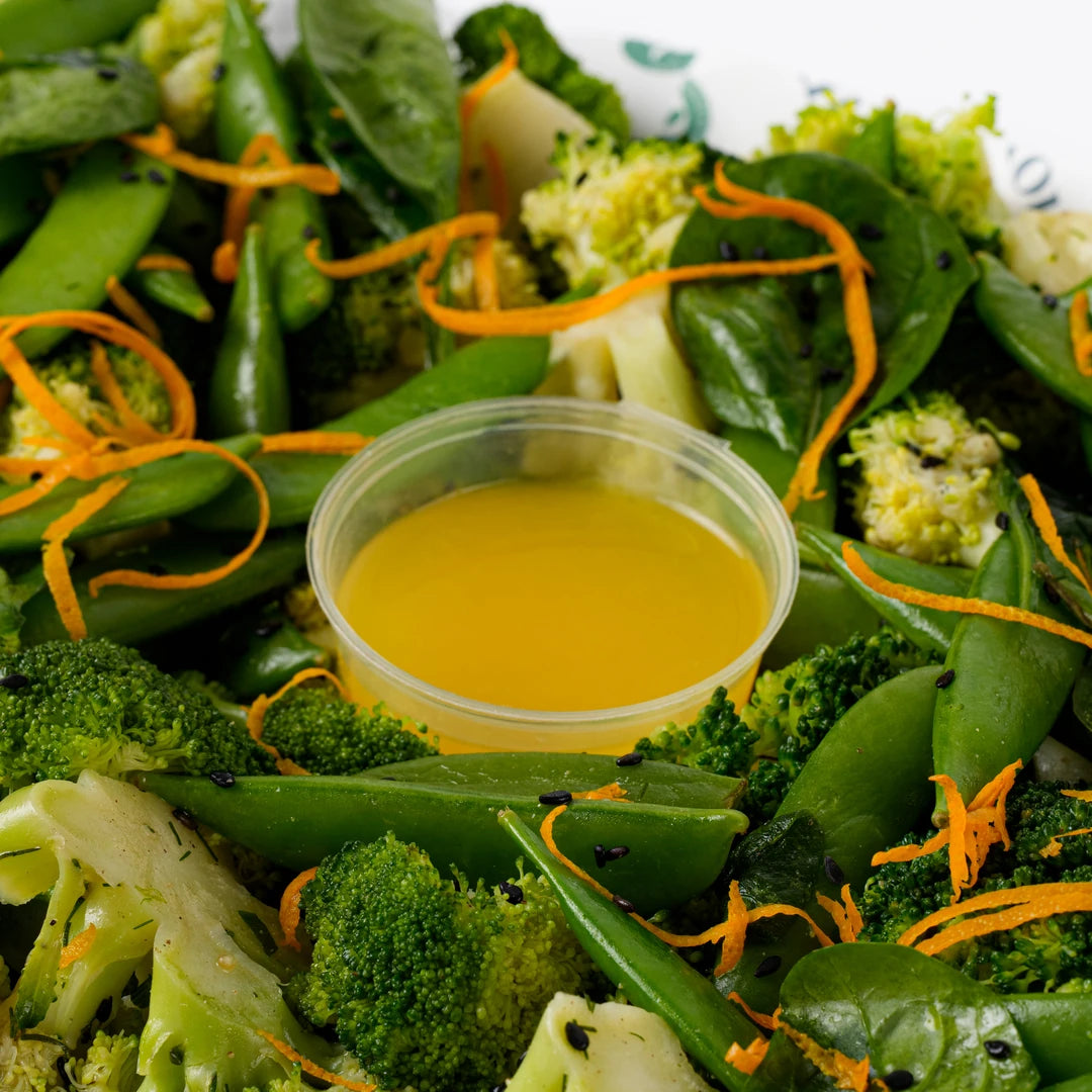 Close up of broccoli and sugar snap salad with citrus dressing, Route Catering London