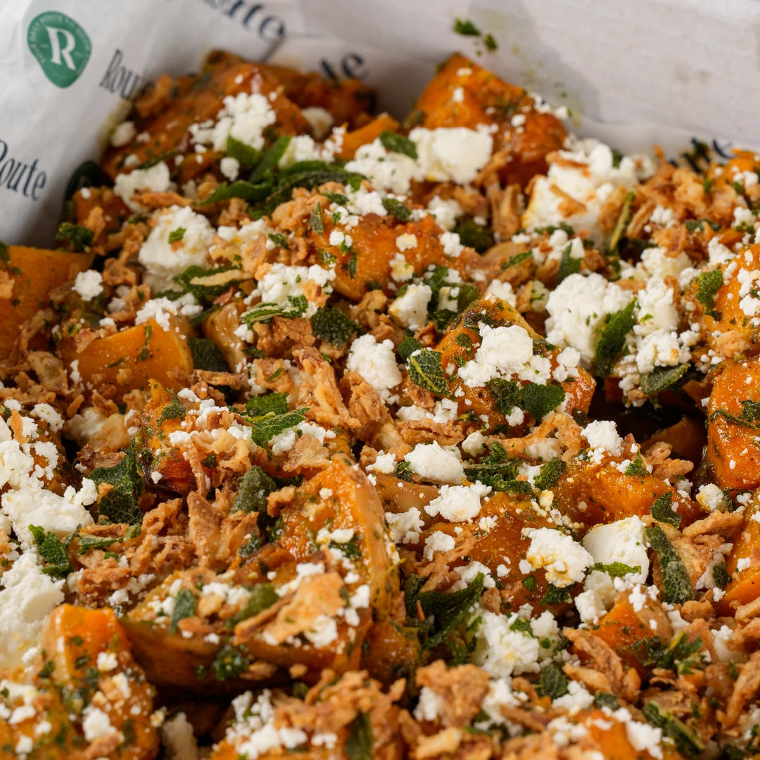 Close-up of roasted butternut squash salad with feta and sage - Route Catering