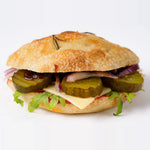 Close up of cheese ploughman's focaccia with pickles and chutney, Route Catering London