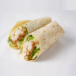Chicken Caesar wrap cut to show the filling, Route Catering London