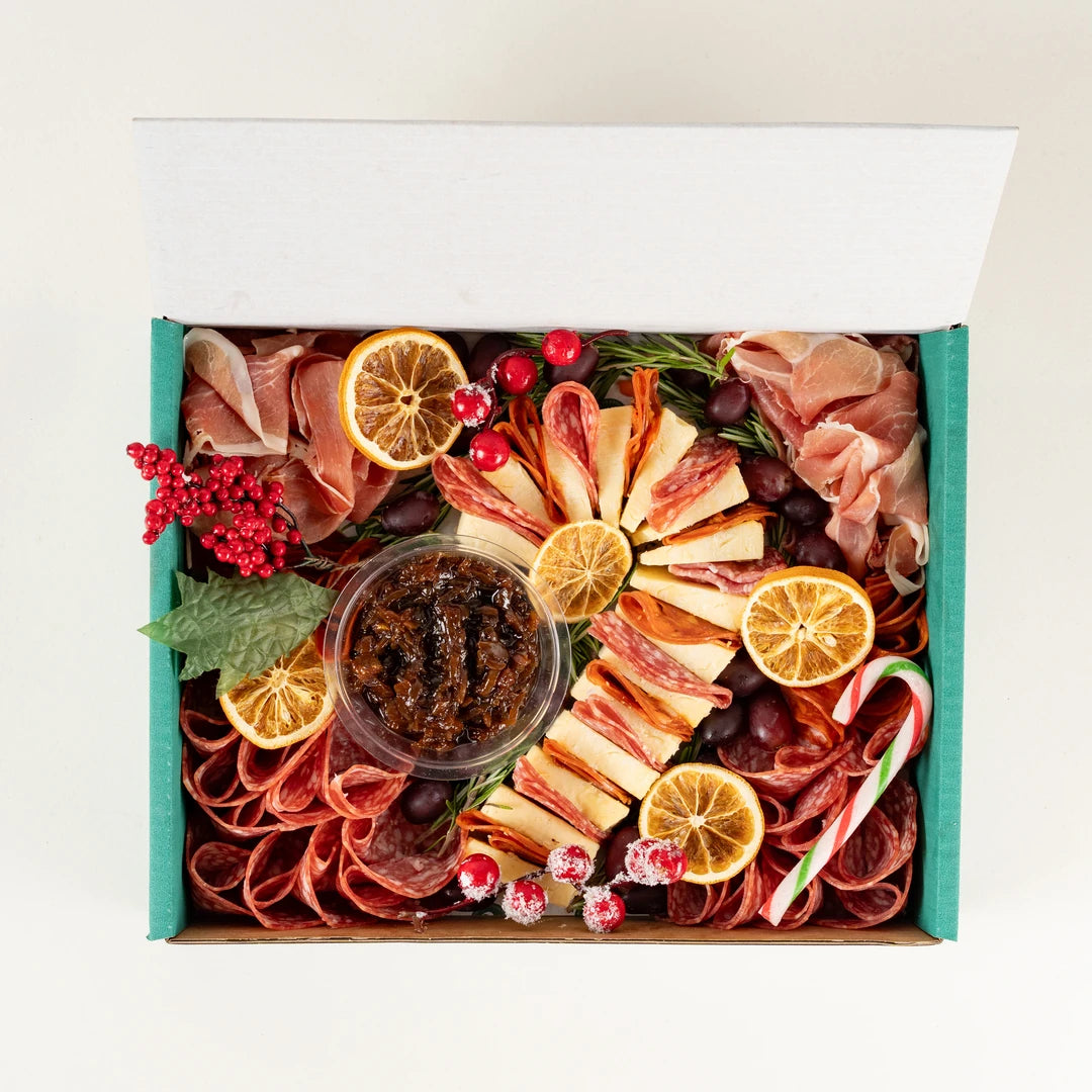 Christmas Charcuterie Platter with cured meats, cheese, chutney, dried orange and candy canes from above, serves 10 - Route Catering