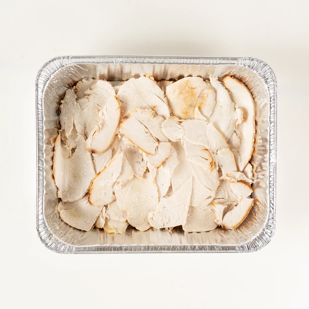 Christmas Dinner Platter roast chicken slices in a foil tray - Route Catering