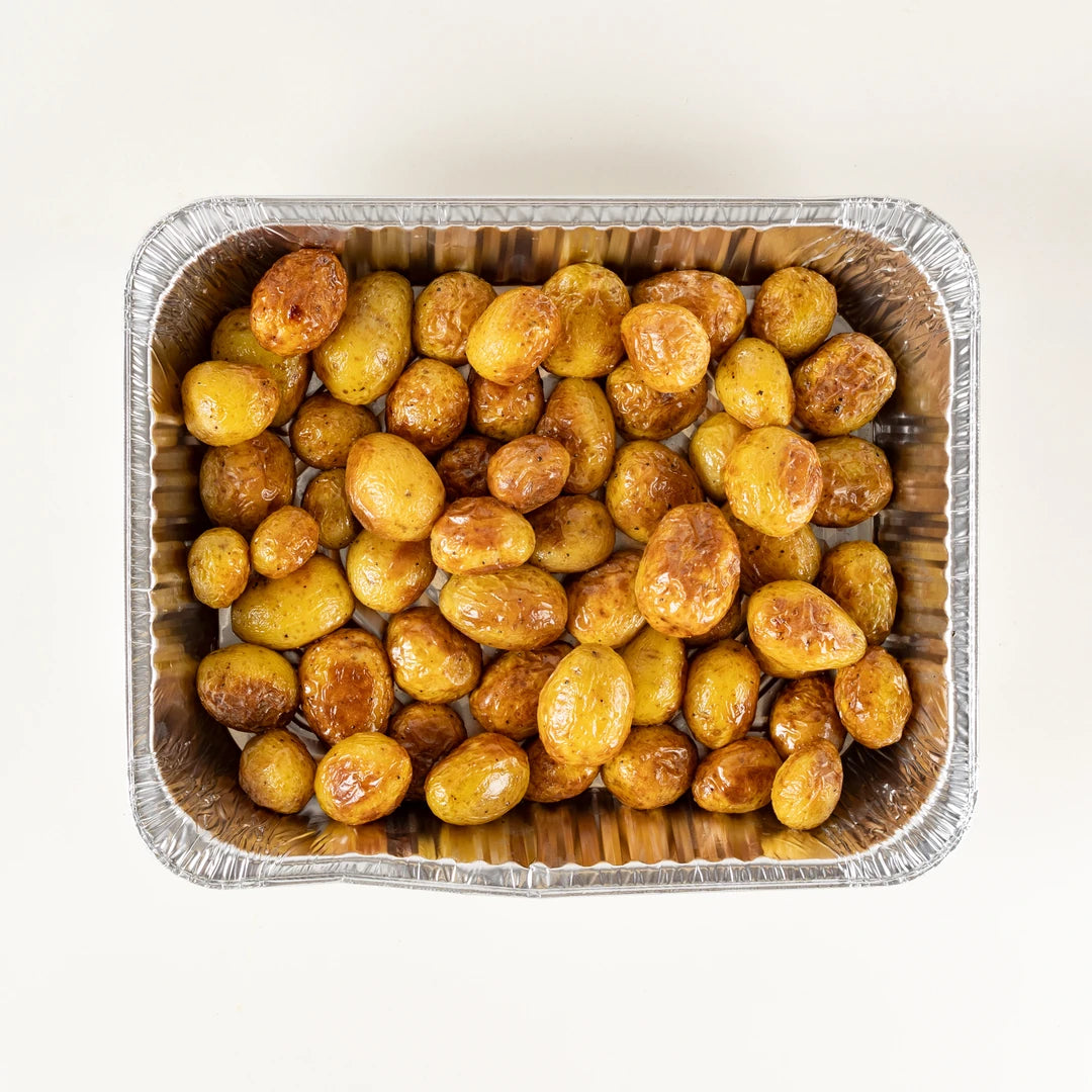 Christmas Dinner Platter roast potatoes in a foil tray - Route Catering