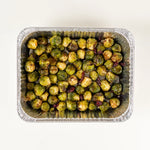 Christmas Dinner Platter roasted Brussels sprouts in a foil tray - Route Catering