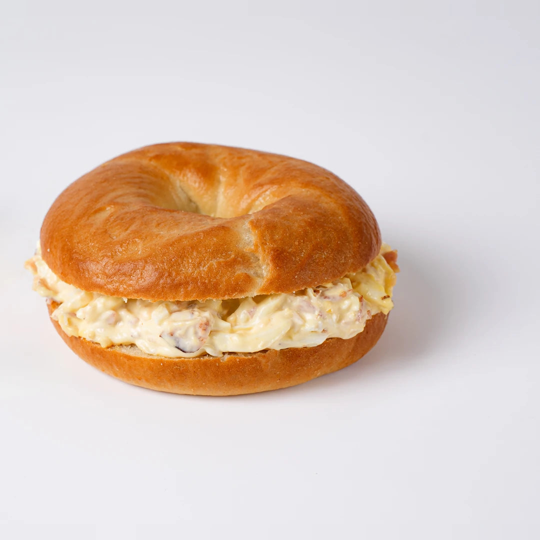 Crispy bacon and boiled egg bagel, breakfast catering London, Route Catering