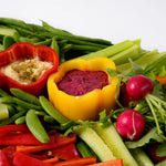 Close up of peppers filled with hummus and beetroot dip, Route Catering London