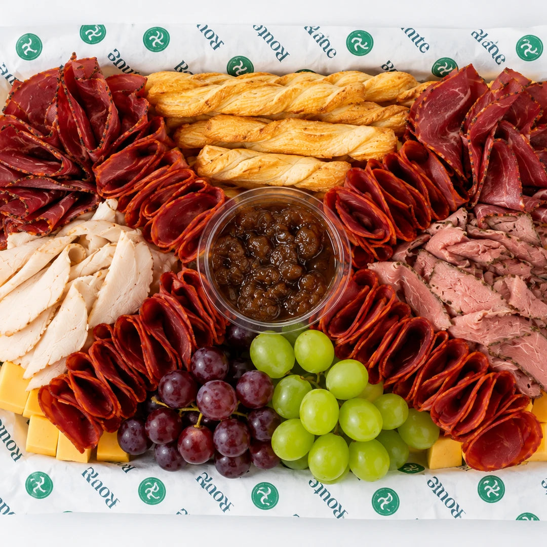Halal Charcuterie Platter with beef pastrami, salt beef, chicken salami, cheeses, grapes and breadsticks, serves 10 - Route Catering
