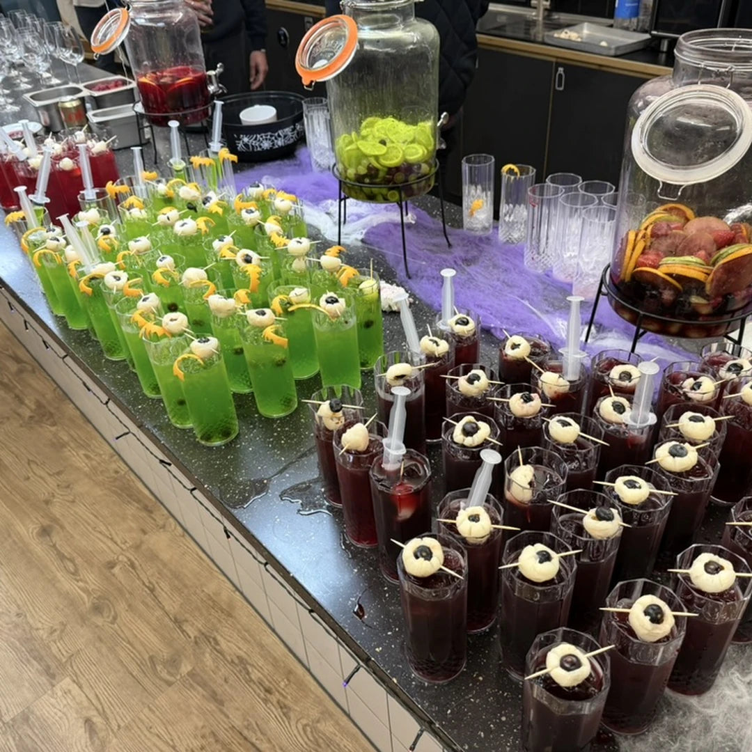Halloween cocktail pop-up bar in a London office with Green Potion Punch and Dragon Fruit Punch by Route Catering