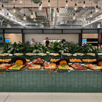 Long Halloween graze table set up in a London office canteen