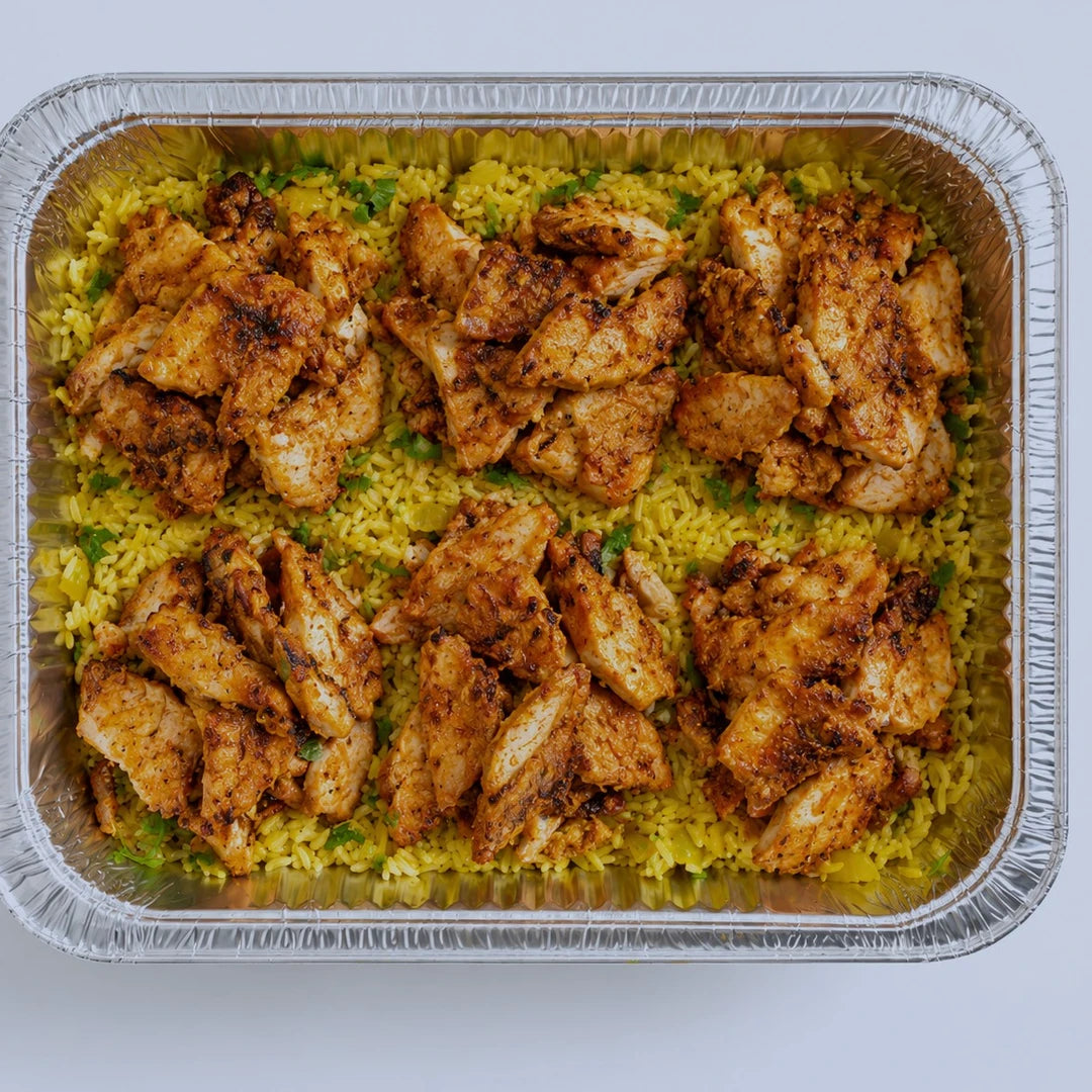 Harissa Chicken with Lemon and Herb Brown Rice platter, serves 6, in a foil tray - Route Catering