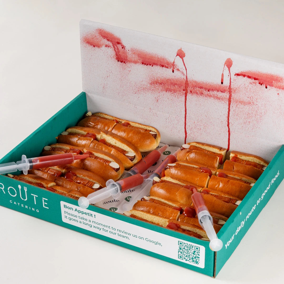 Hot Dog Fingers Halloween box with ketchup blood syringes - Route Catering
