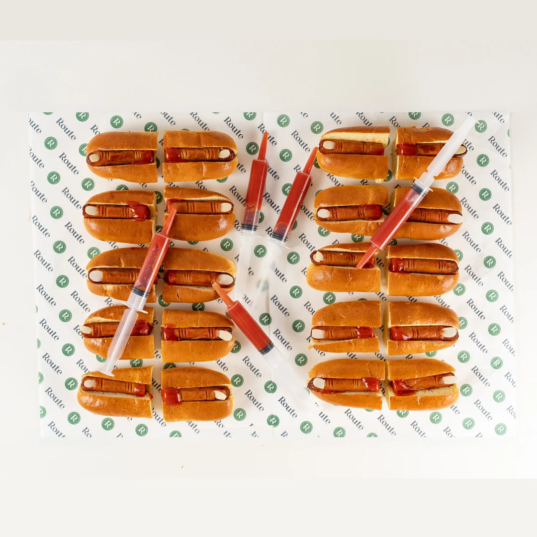 Hot Dog Fingers Halloween platter of 20 severed finger hot dogs in brioche rolls - Route Catering