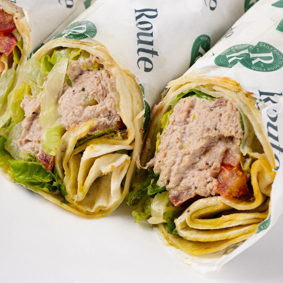 Close up of meat sandwich wraps with chicken and bacon, Route Catering London