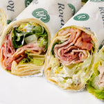 Meat sandwich wraps cut to show the filling, Route Catering London