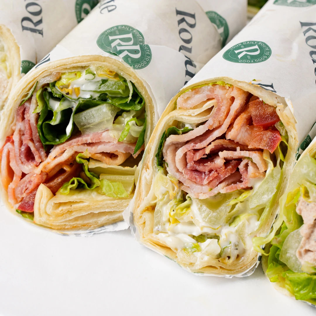 Meat sandwich wraps cut to show the filling, Route Catering London