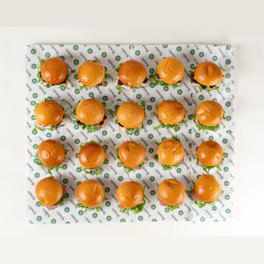 Mini Christmas Sandwich Platter, 20 mini rolls laid out on Route Catering paper