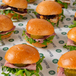 Close-up of mini Christmas sandwich rolls with turkey, cranberry and rocket - Route Catering