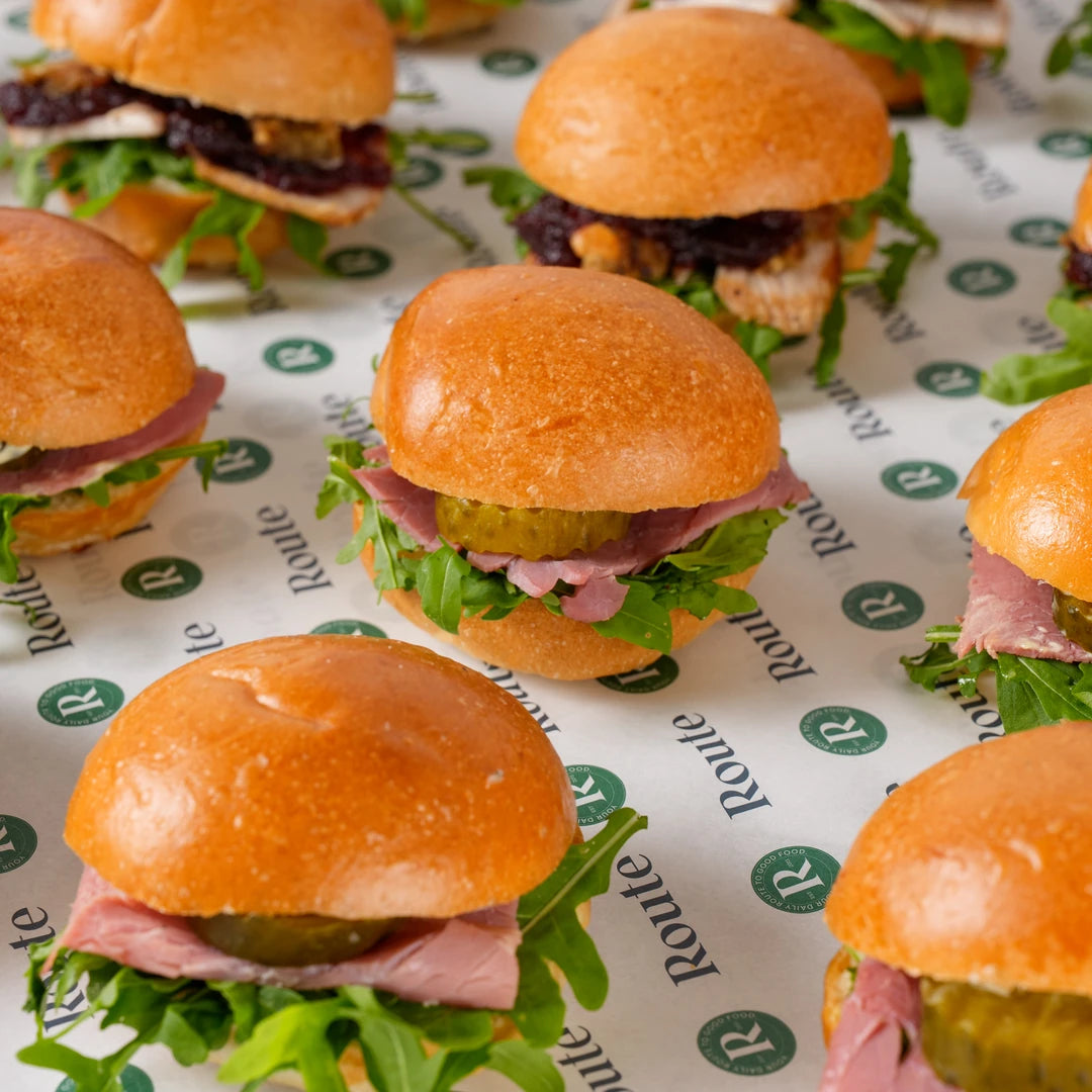 Close-up of mini Christmas sandwich rolls with turkey, cranberry and rocket - Route Catering
