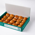 Mini veggie breakfast rolls in Route Catering delivery box, 20 per platter