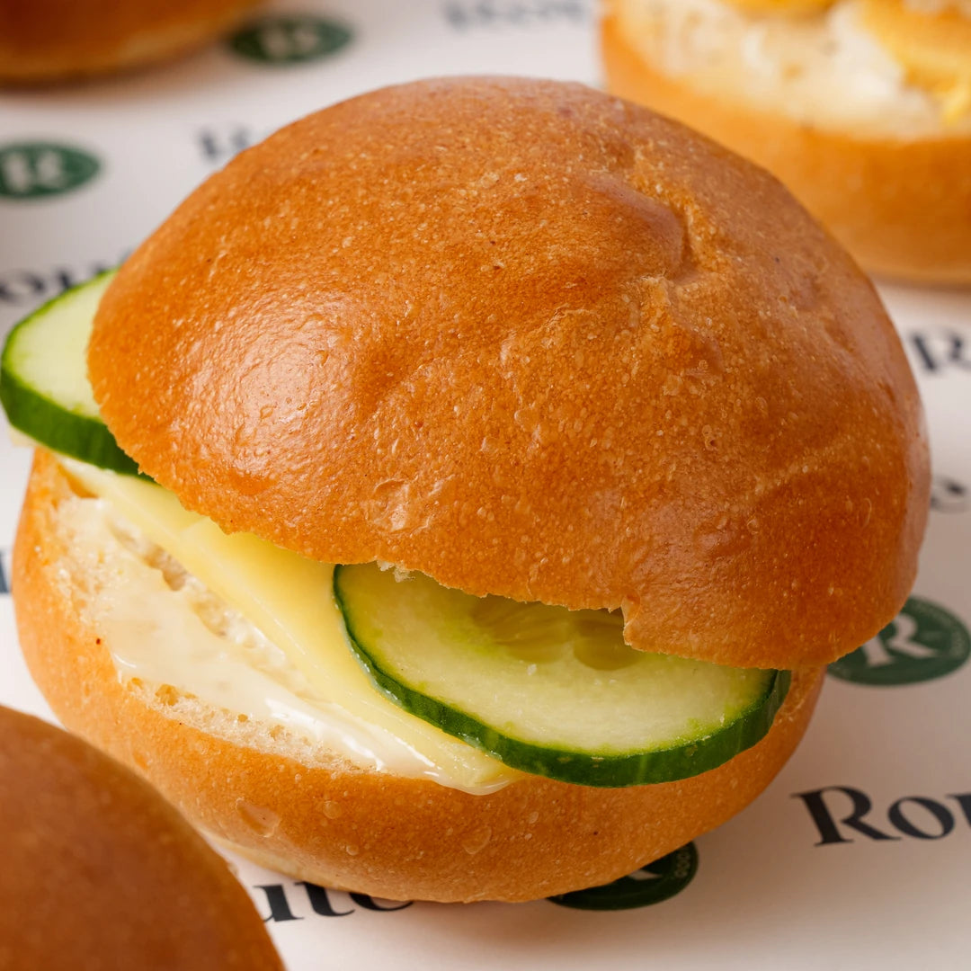 Close up of mini breakfast roll with cucumber and cream cheese, Route Catering London
