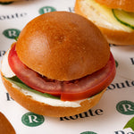 Close up of mini breakfast roll with tomato and mozzarella, Route Catering London