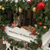 Route Catering mulled wine and filo mince pie cart dressed with festive garland for a London office pop-up