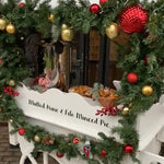Route Catering mulled wine and filo mince pie cart dressed with festive garland for a London office pop-up