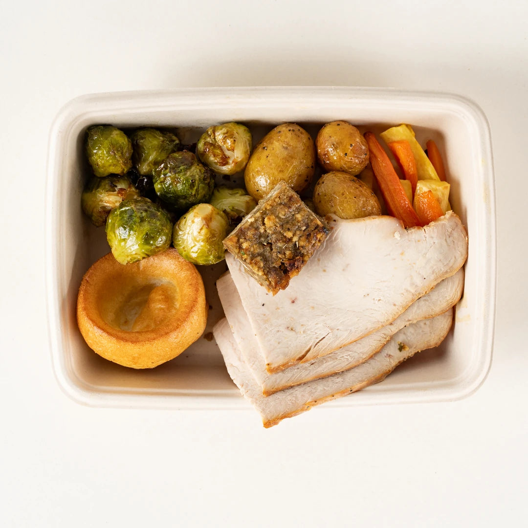 Roast Turkey Dinner box, angled view with sliced turkey and Yorkshire pudding - Route Catering