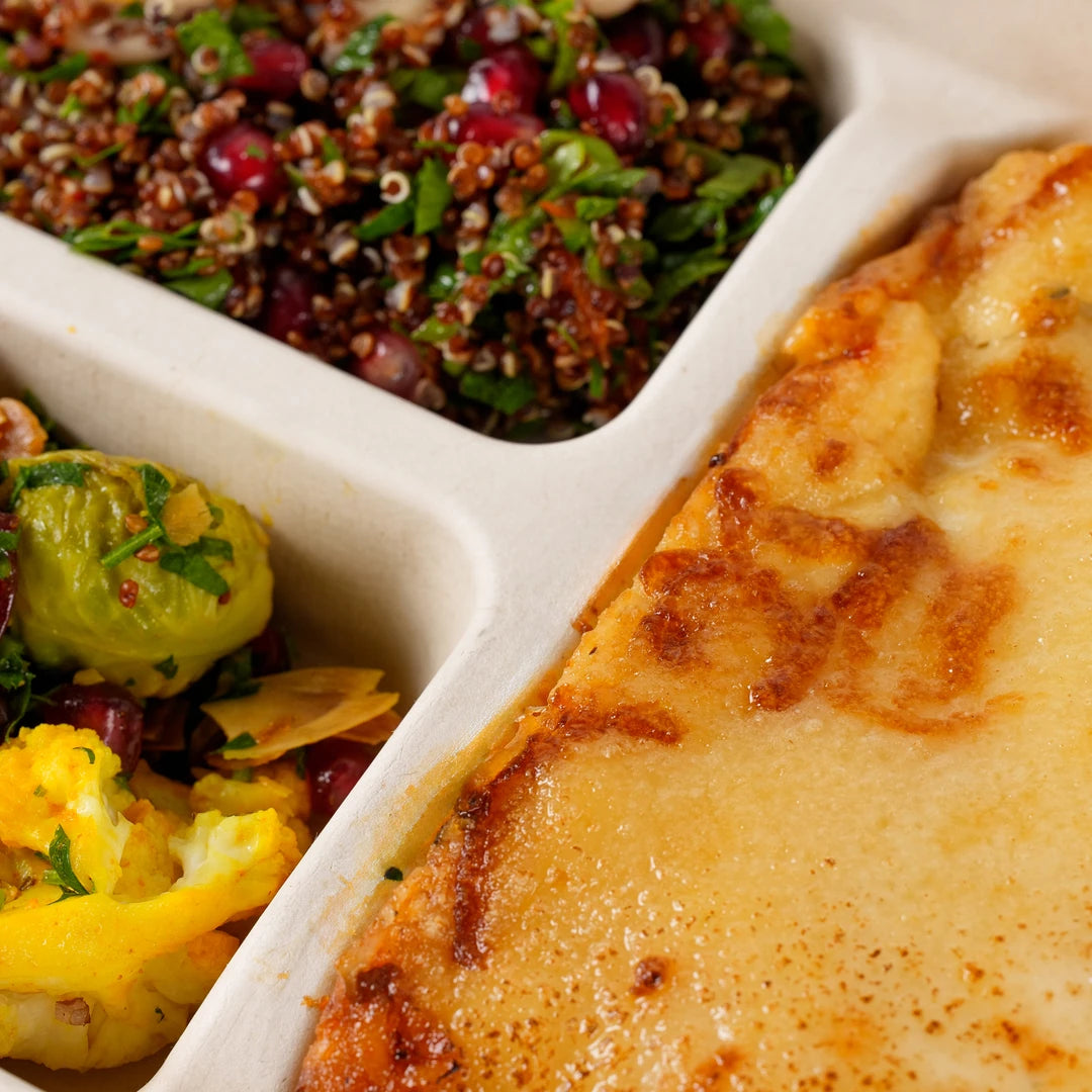 Close-up of roasted vegetable lasagne with the two winter salads - Route Catering