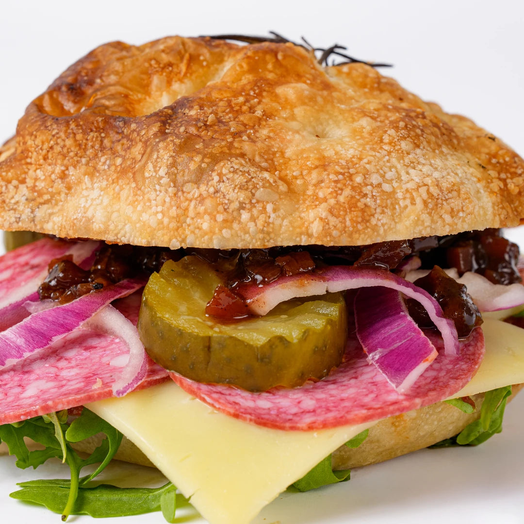Close up of salami, cheese and pickle focaccia, Route Catering London