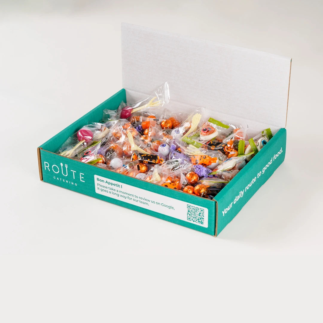 Spooky Pick n Mix Sweets Halloween box opened to show wrapped and gummy sweets - Route Catering