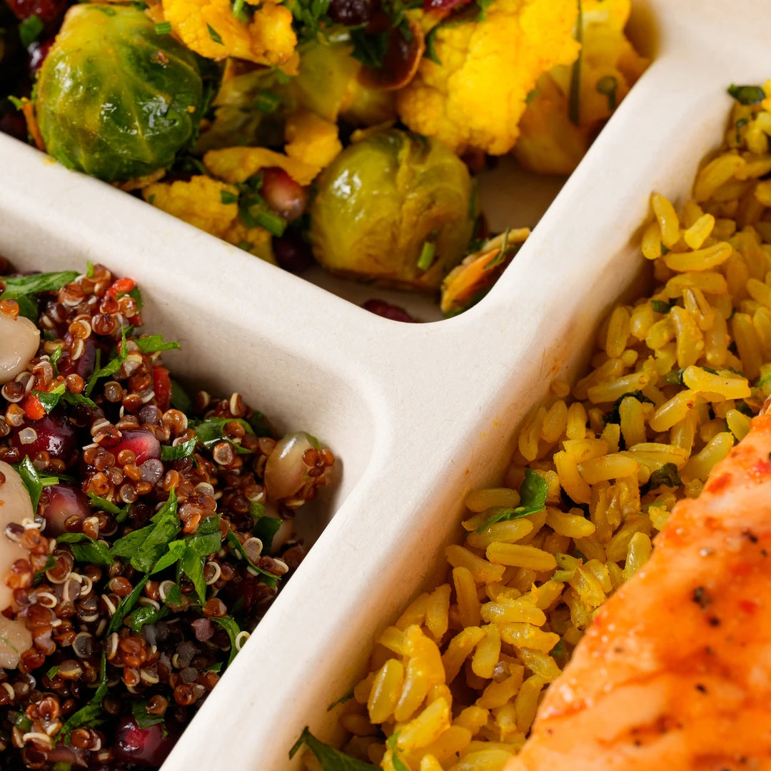 Close-up of sweet chilli glazed salmon on herb brown rice with red quinoa salad - Route Catering