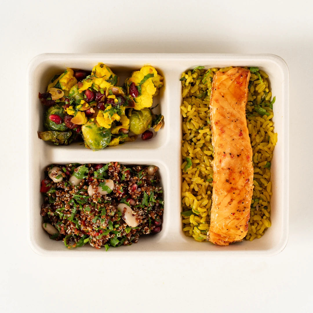 Sweet Chilli Glazed Salmon Lunchbox from above with lemon and herb brown rice and two winter salads - Route Catering