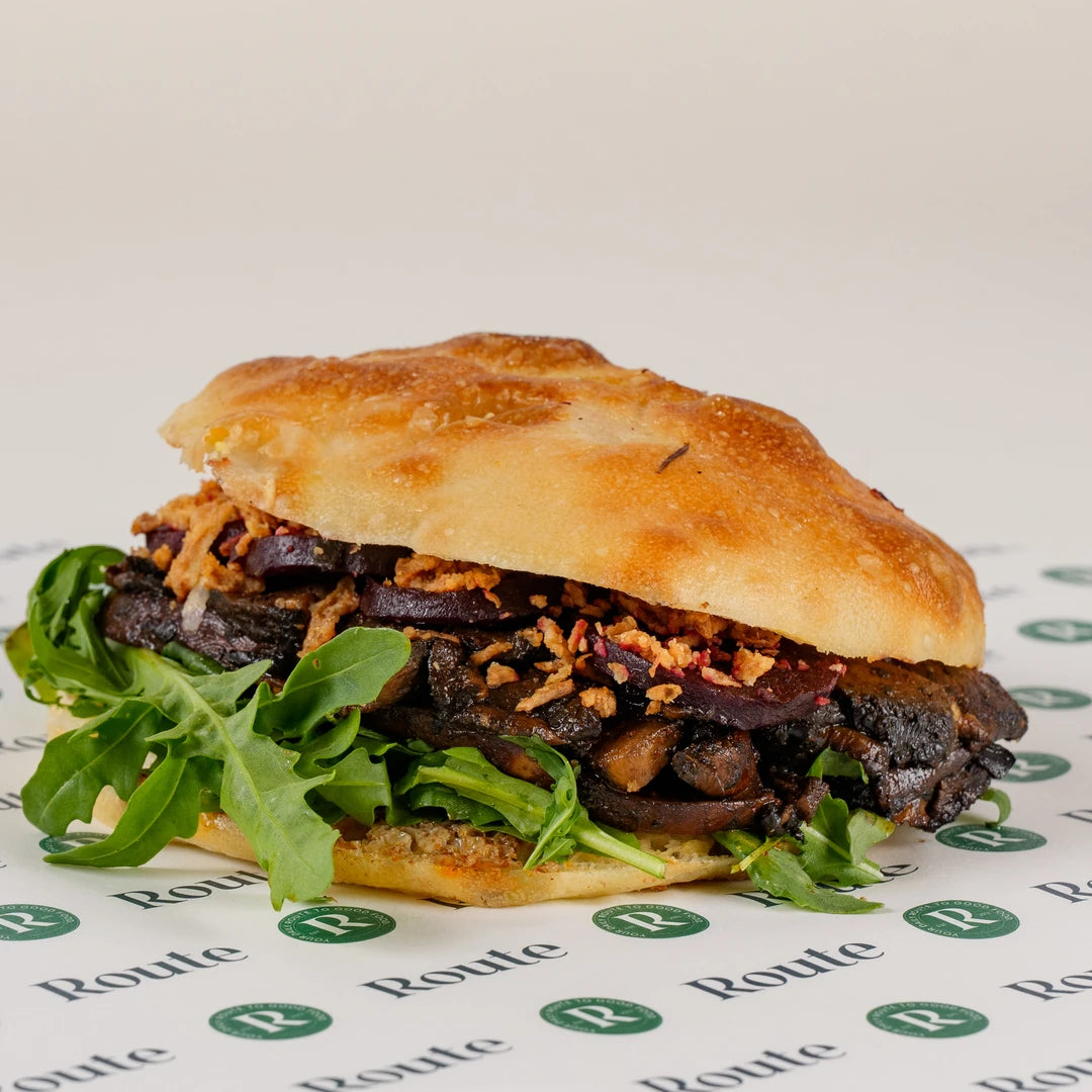 Truffle Mushroom and Maple Beetroot Focaccia, angled view of the whole focaccia sandwich - Route Catering