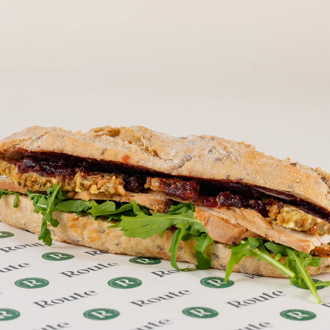 Turkey and Cranberry Baguette with stuffing and rocket on Route Catering paper