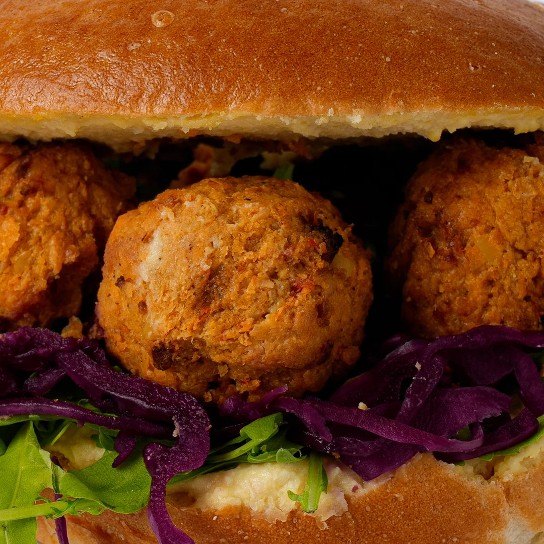 Close up of vegan kofta balls with red cabbage and rocket, Route Catering London
