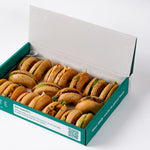 Vegetarian bagels arranged on branded paper, office breakfast catering London