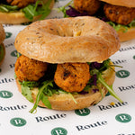Close up of vegan kofta and rocket bagel, Route Catering London
