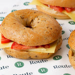 Close up of cheese and tomato bagel, Route Catering London