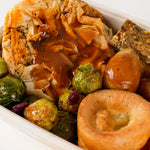 Close-up of the filo Farmers Winter Wellington with gravy and Yorkshire pudding - Route Catering