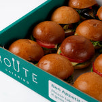 Vegetarian mini sandwiches in Route Catering delivery box, 20 per platter