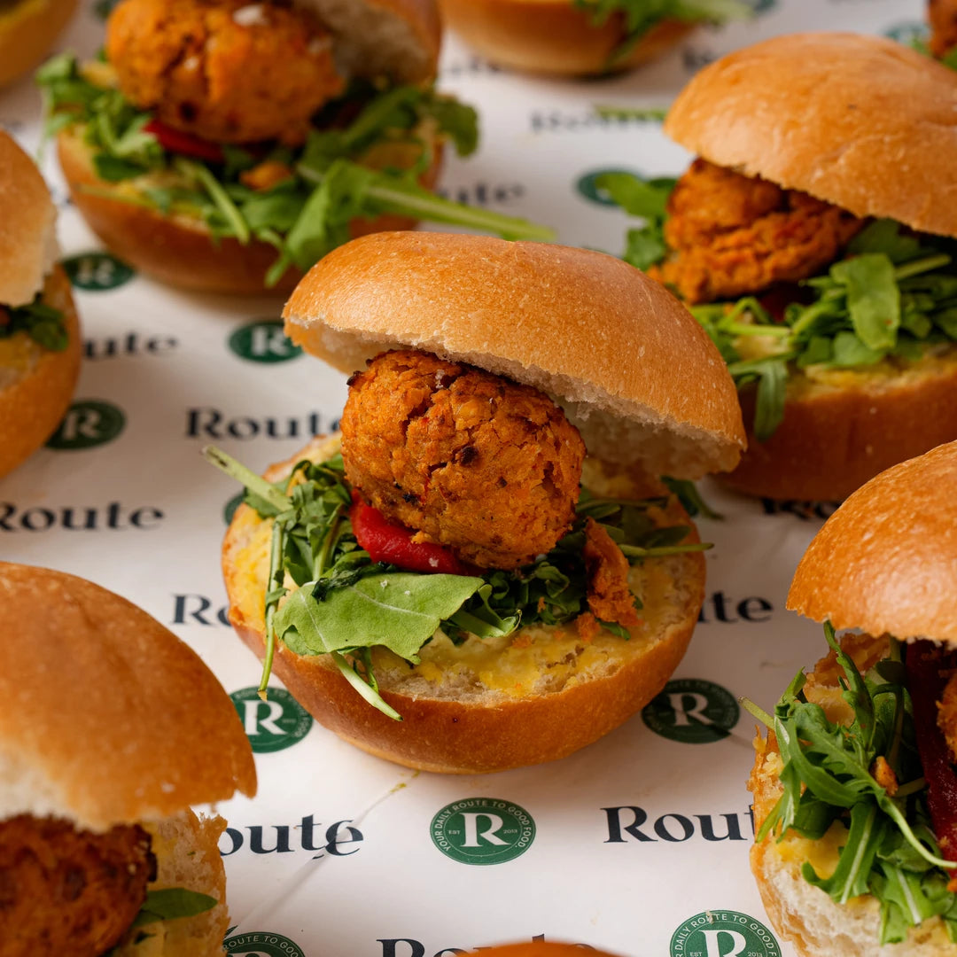 Close up of vegetarian slider with rocket in a brioche bun, Route Catering London